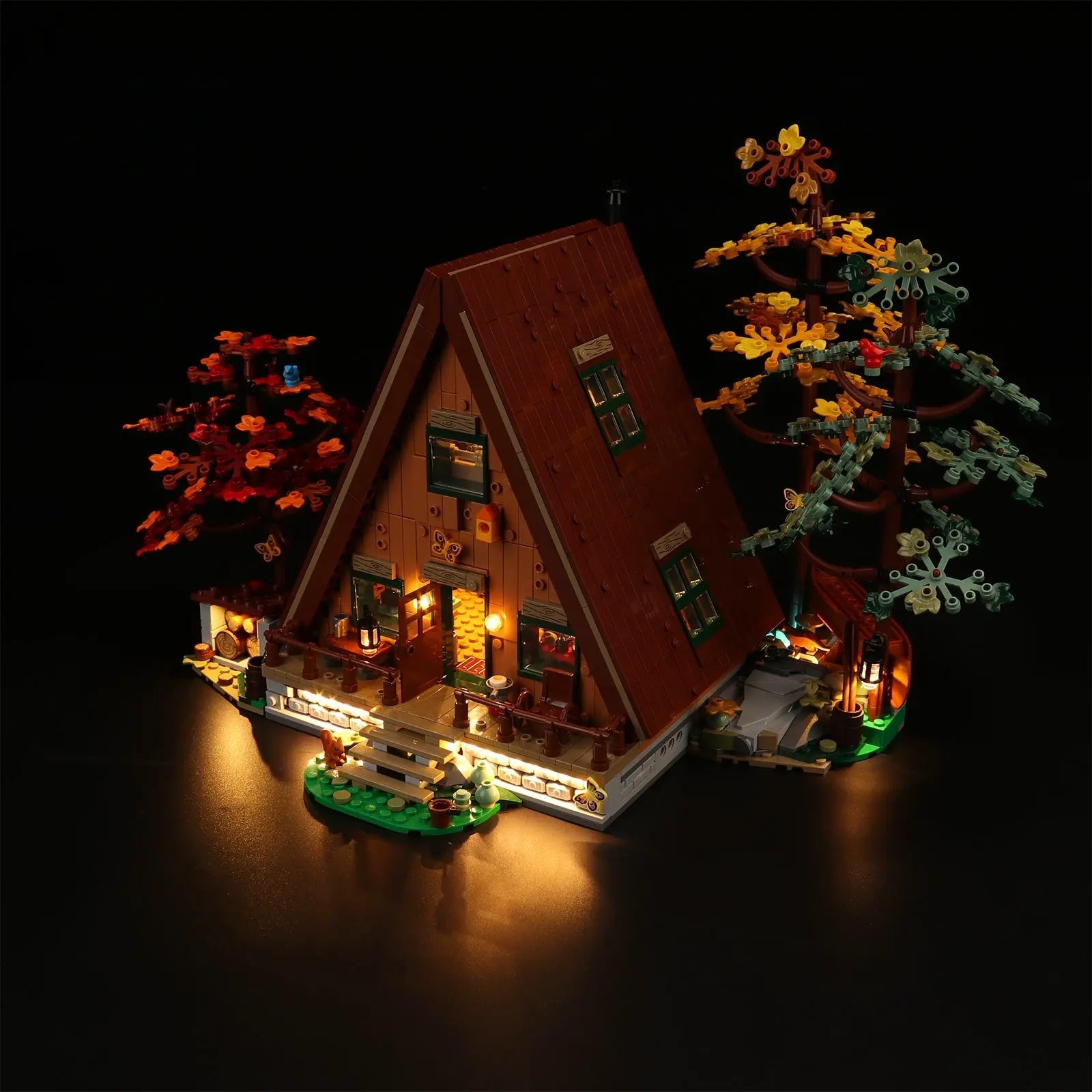 Close-up of LED lights on LEGO Ideas A-Frame Cabin #21338