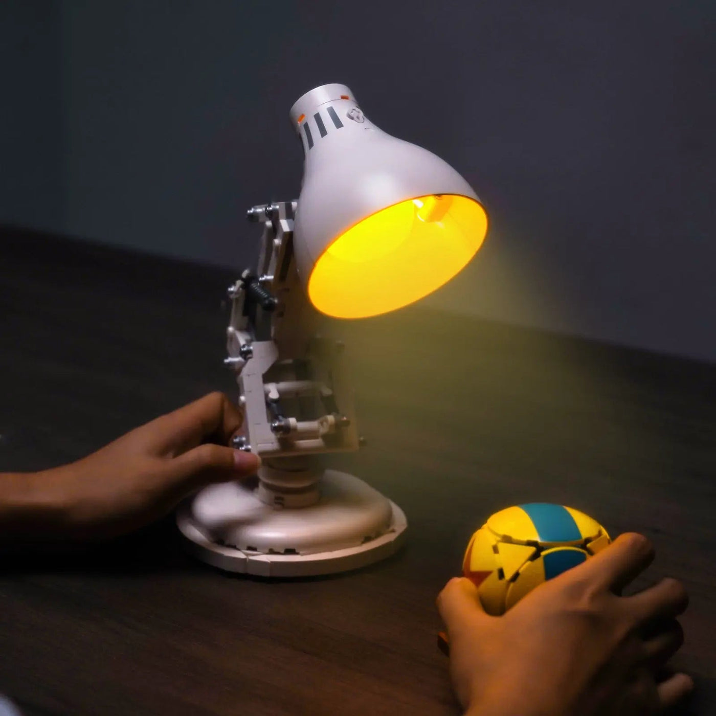 LEGO® Ideas ǀ Disney Pixar Luxo Jr. #21357 installed and glowing, with the custom LED lighting
