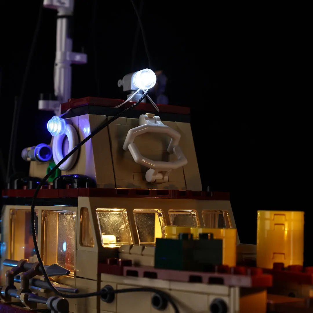 LEGO® Ideas Jaws #21350 side angle with lights on, with the USB-powered LED light kit