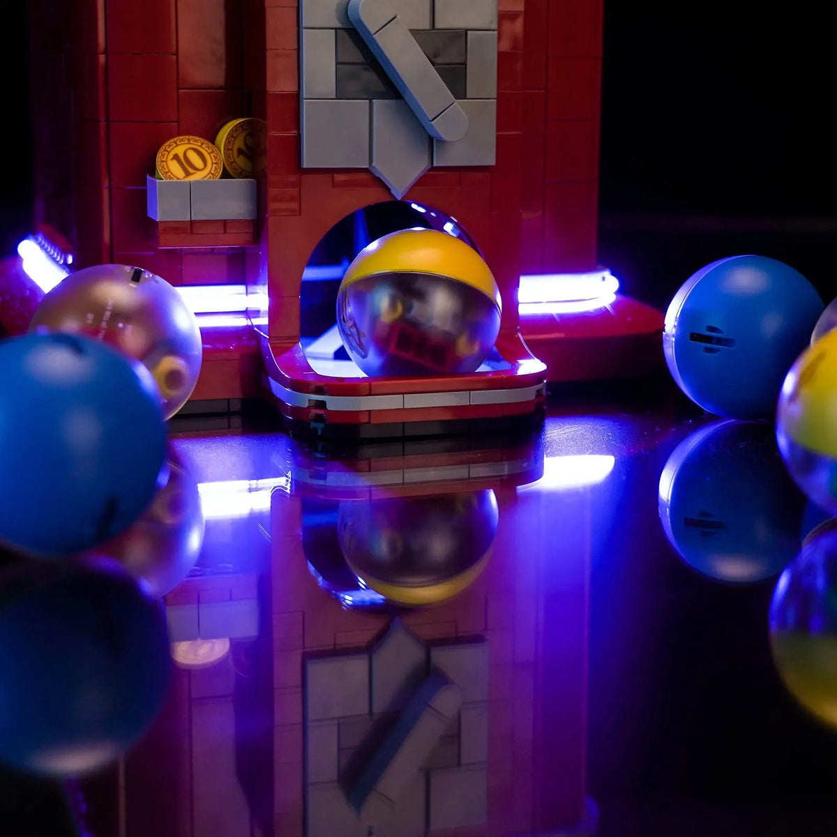 LEGO® Ideas Minifigure Vending Machine #21358 brightened interior detail, with the LED lights
