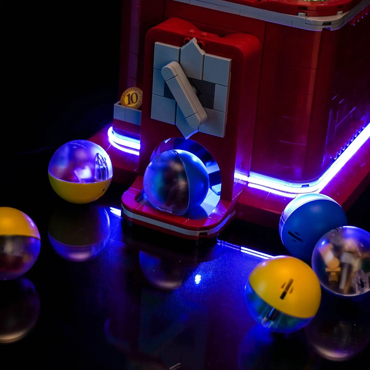 LEGO® Ideas Minifigure Vending Machine #21358 display lighting in a dark room, with the custom LED lighting