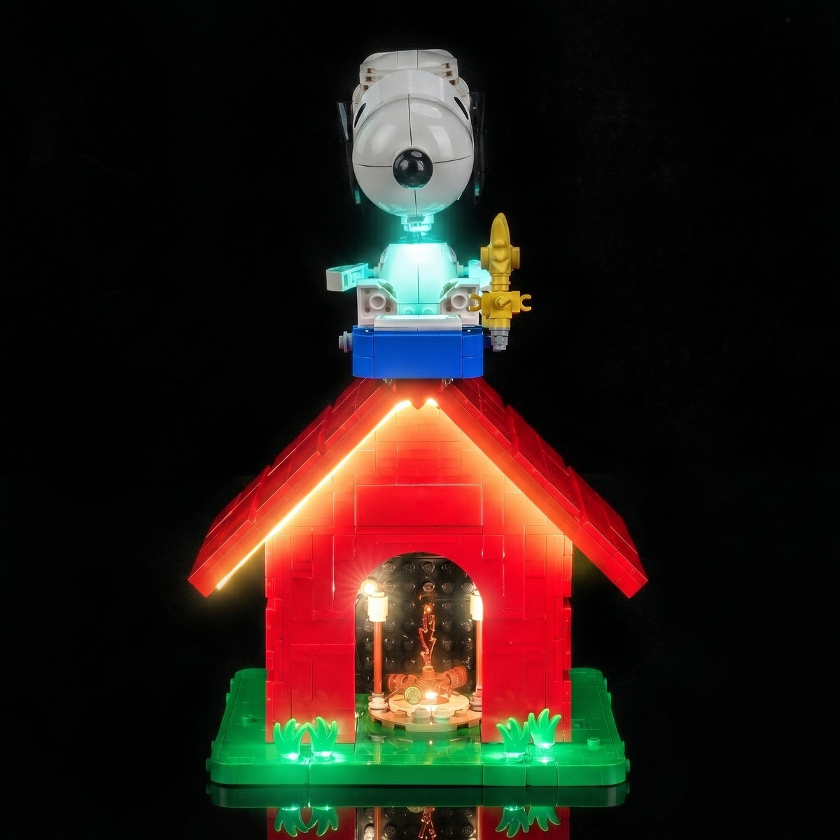 LEGO® Ideas Peanuts Snoopy's Doghouse #21368 LED kit powered on, with the premium LED light kit