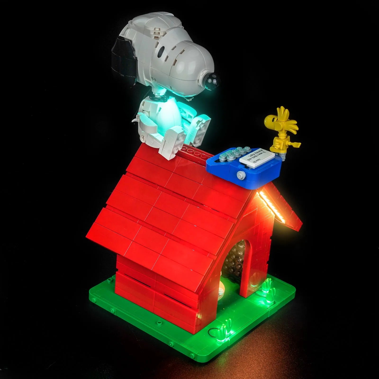 LEGO Ideas Peanuts Snoopy's Doghouse #21368 lit up - front angle
