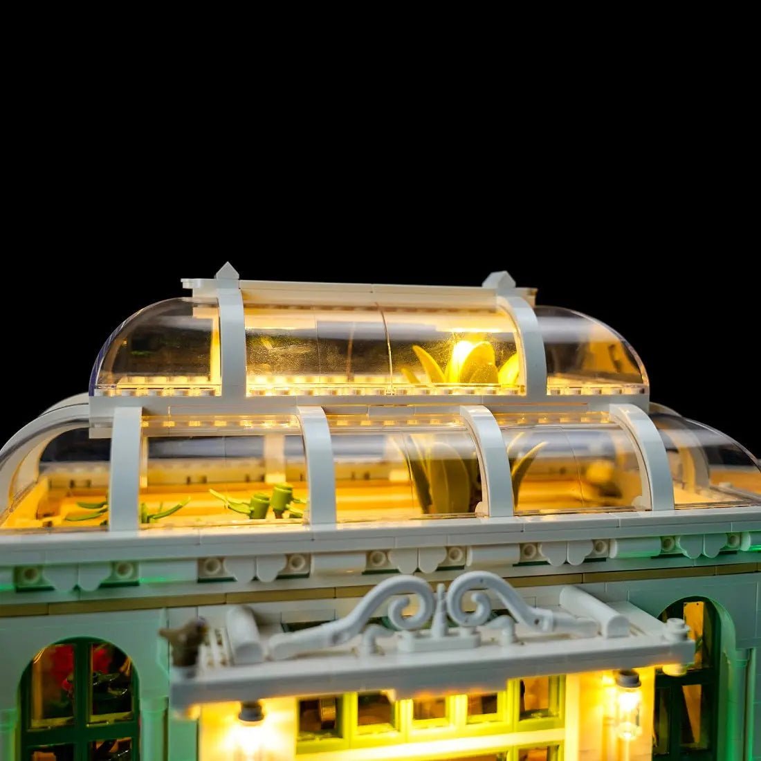 LEGO Ideas The Botanical Garden #21353 illuminated at night