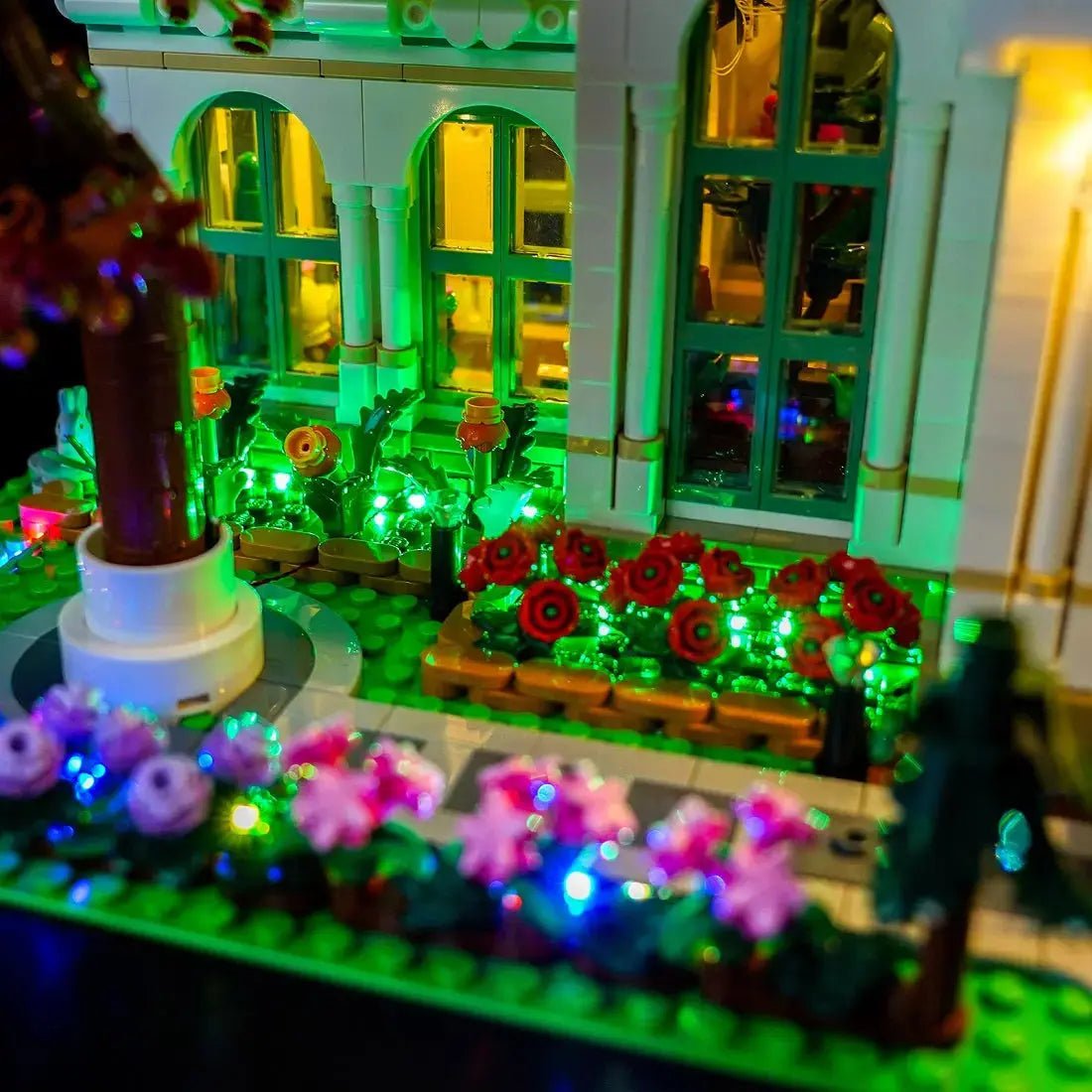 LEGO® Ideas The Botanical Garden #21353 installed and glowing, with the display light kit