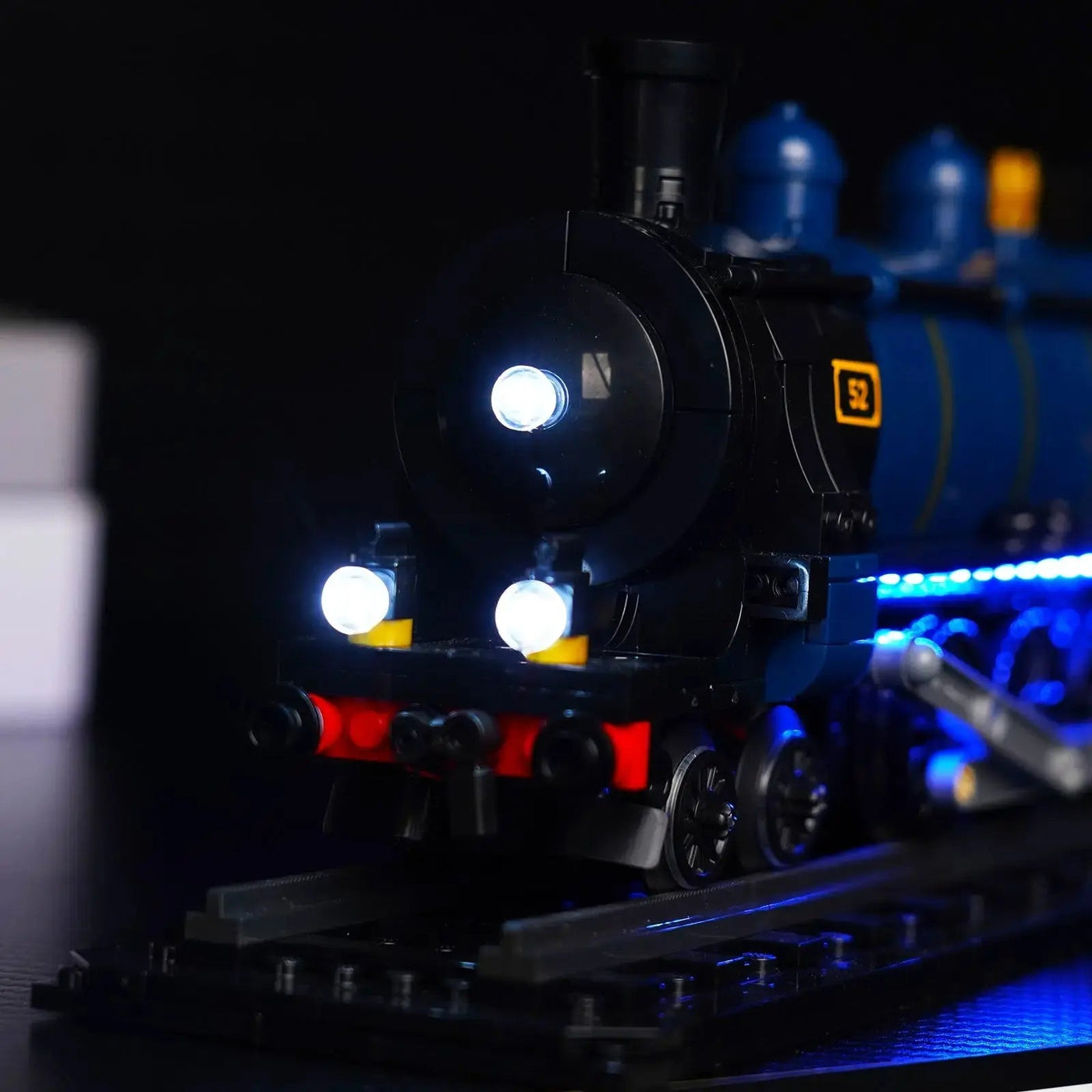 LEGO® Ideas The Orient Express Train #21344 fully illuminated on display, with the USB-powered LED light kit