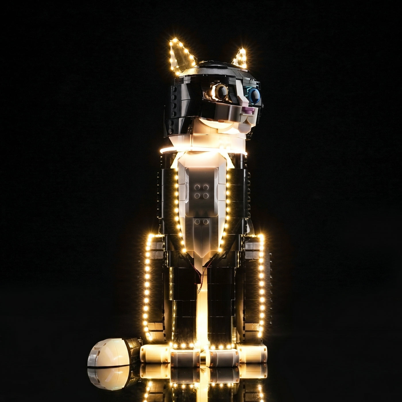 side angle with lights on: Bright My Bricks premium LED light kit for LEGO® Ideas Tuxedo Cat #21349