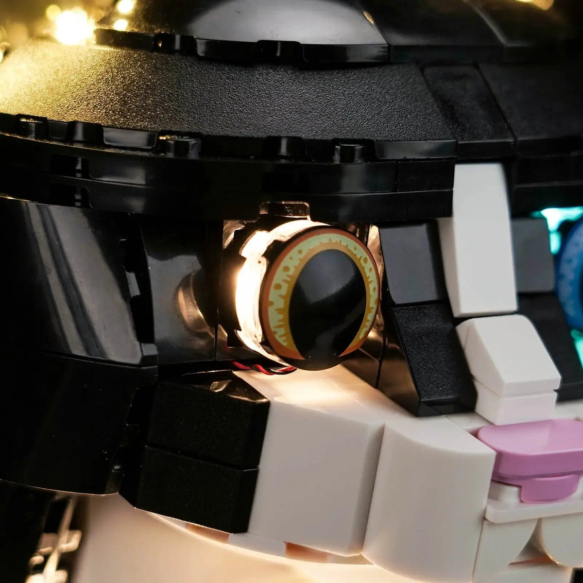 LEGO® Ideas Tuxedo Cat #21349 side angle with lights on, with the custom LED lighting