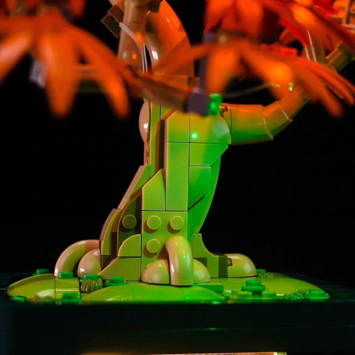LEGO® Japanese Red Maple Bonsai Tree #10348 warm LED glow detail, with the display light kit