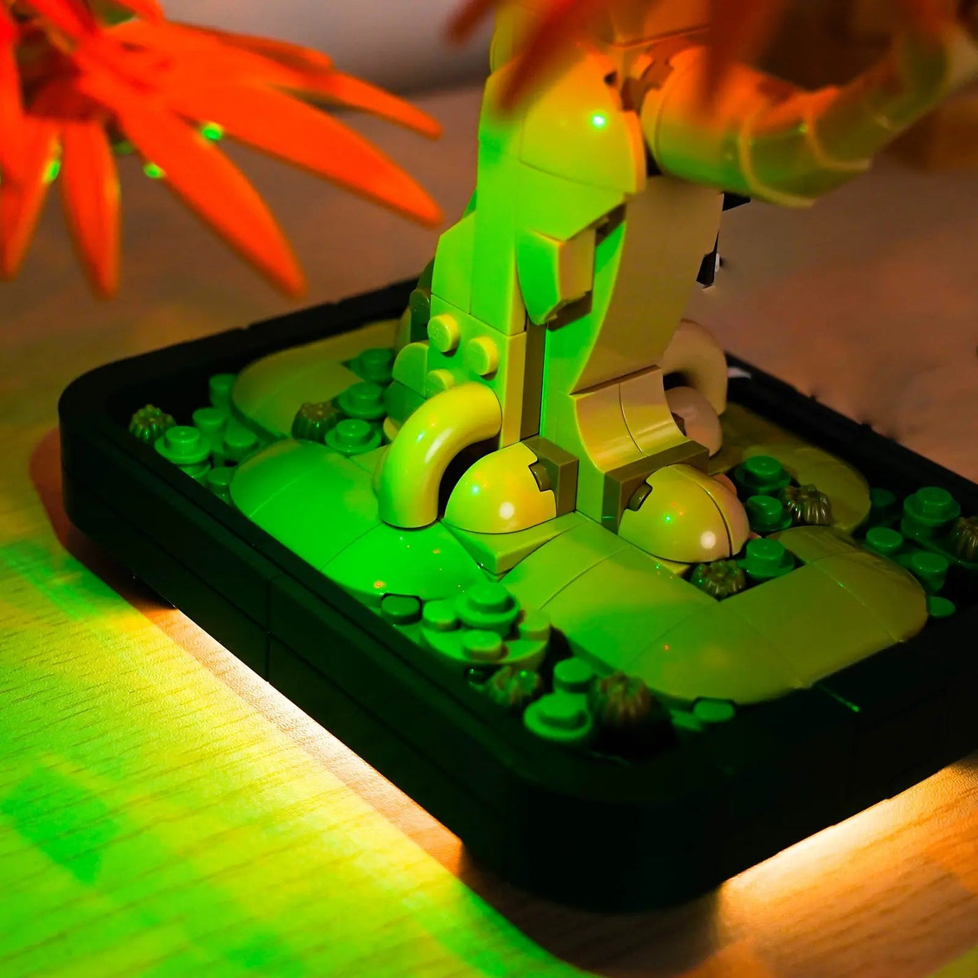 LEGO® Japanese Red Maple Bonsai Tree #10348 — side angle with lights on (USB-powered LED light kit)