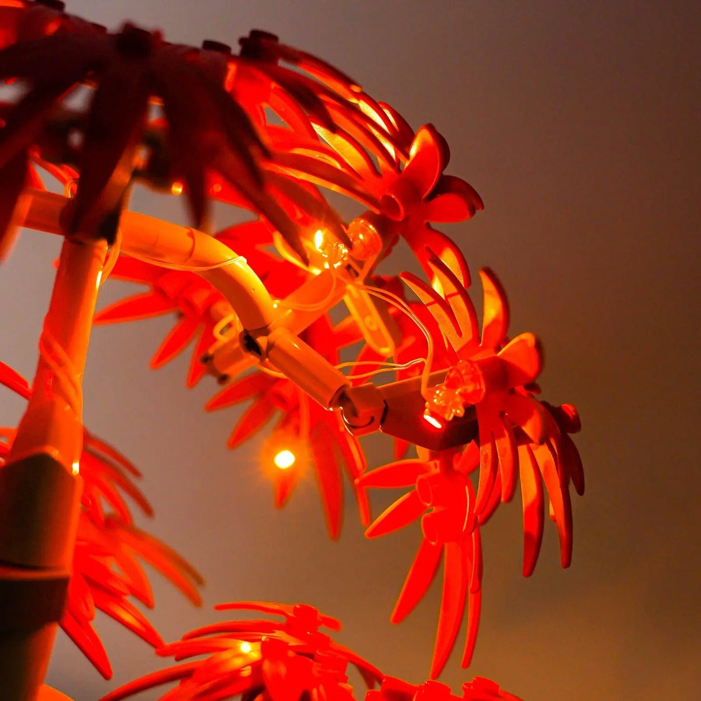 LEGO® Japanese Red Maple Bonsai Tree #10348 night-mode display glow, with the LED light kit