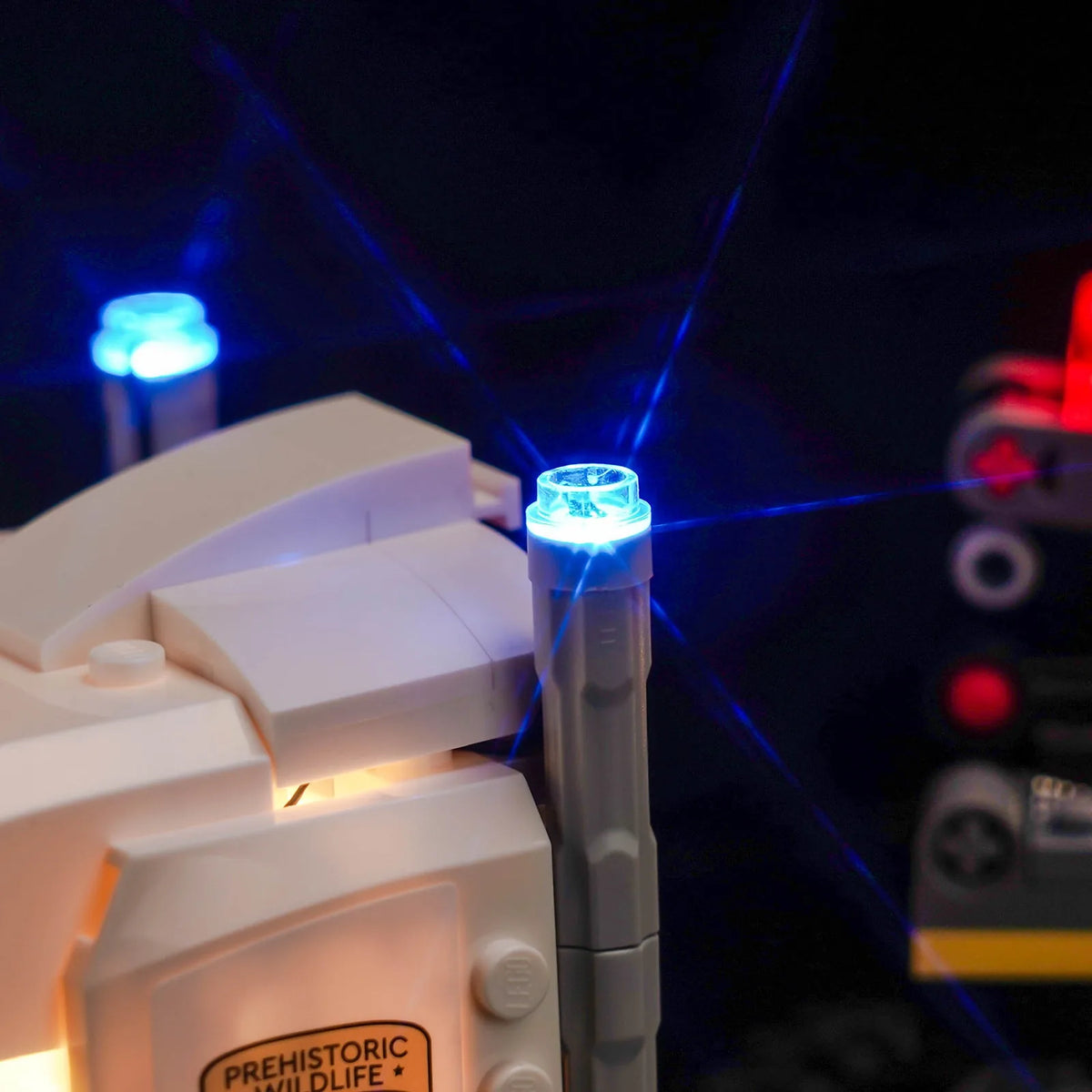 DIY LED light kit for LEGO® Jurassic World Dinosaur Missions: Allosaurus Transport Truck #76966, lighting effect on the build