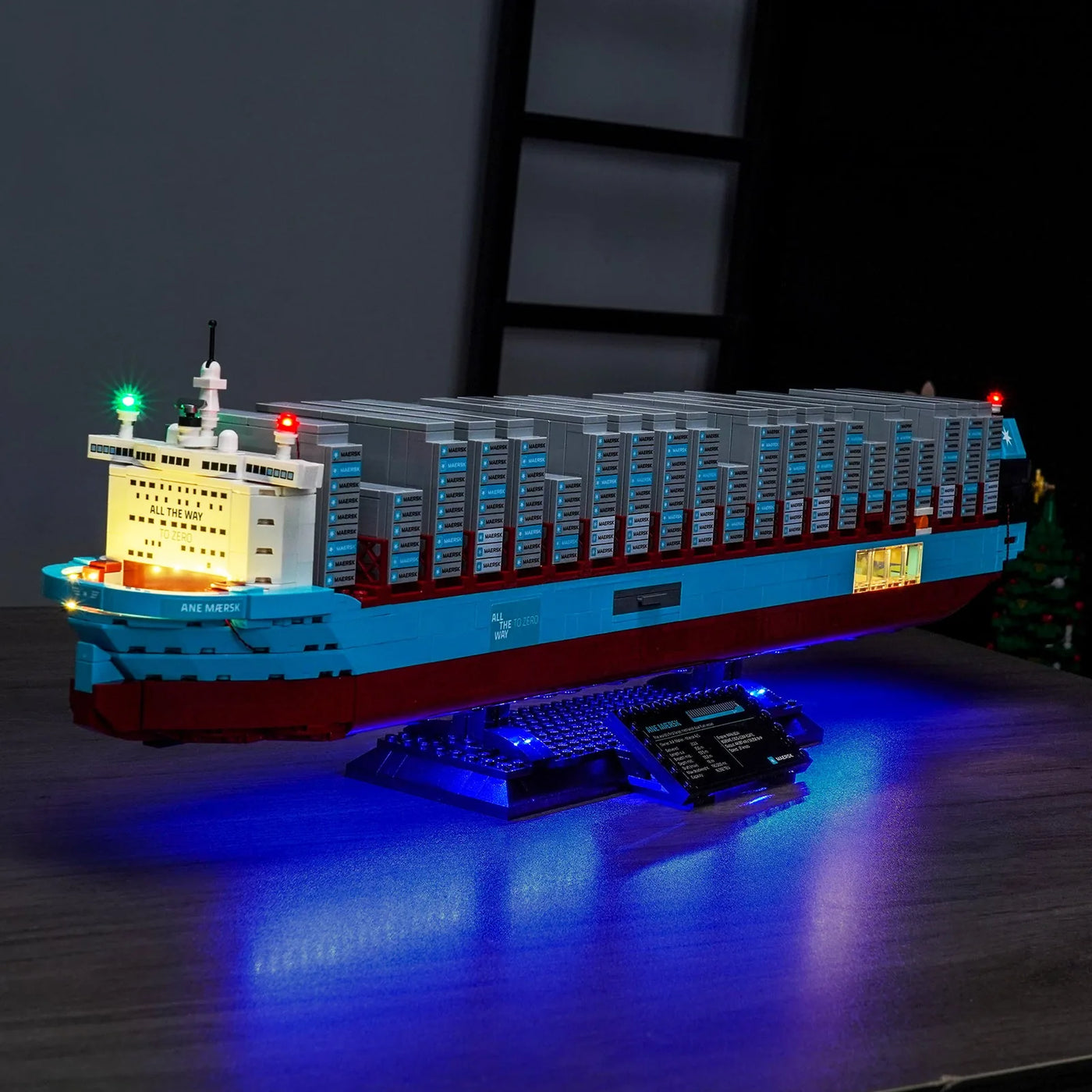 LEGO® Maersk Dual-Fuel Container Vessel #40955 fully illuminated on display, with the light kit