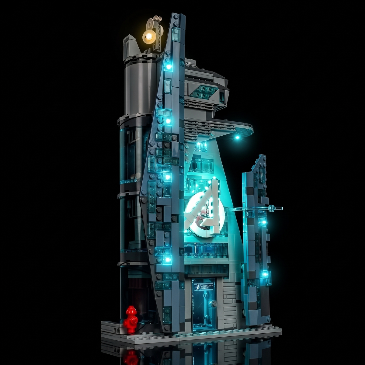 Side view of LEGO® New Avengers Tower #76352 showing illuminated windows and architectural edges