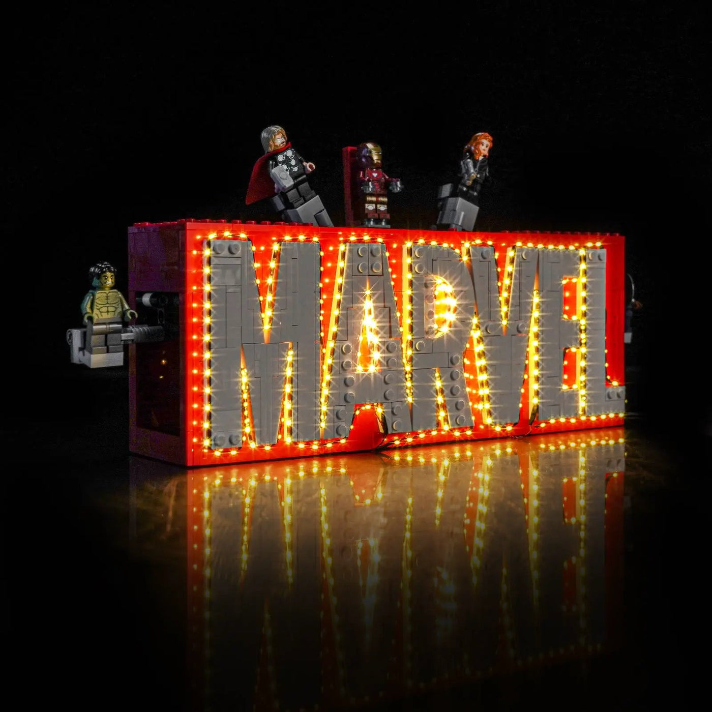 side angle with lights on: Bright My Bricks LED lights for LEGO® Marvel MARVEL Logo & Minifigures #76313