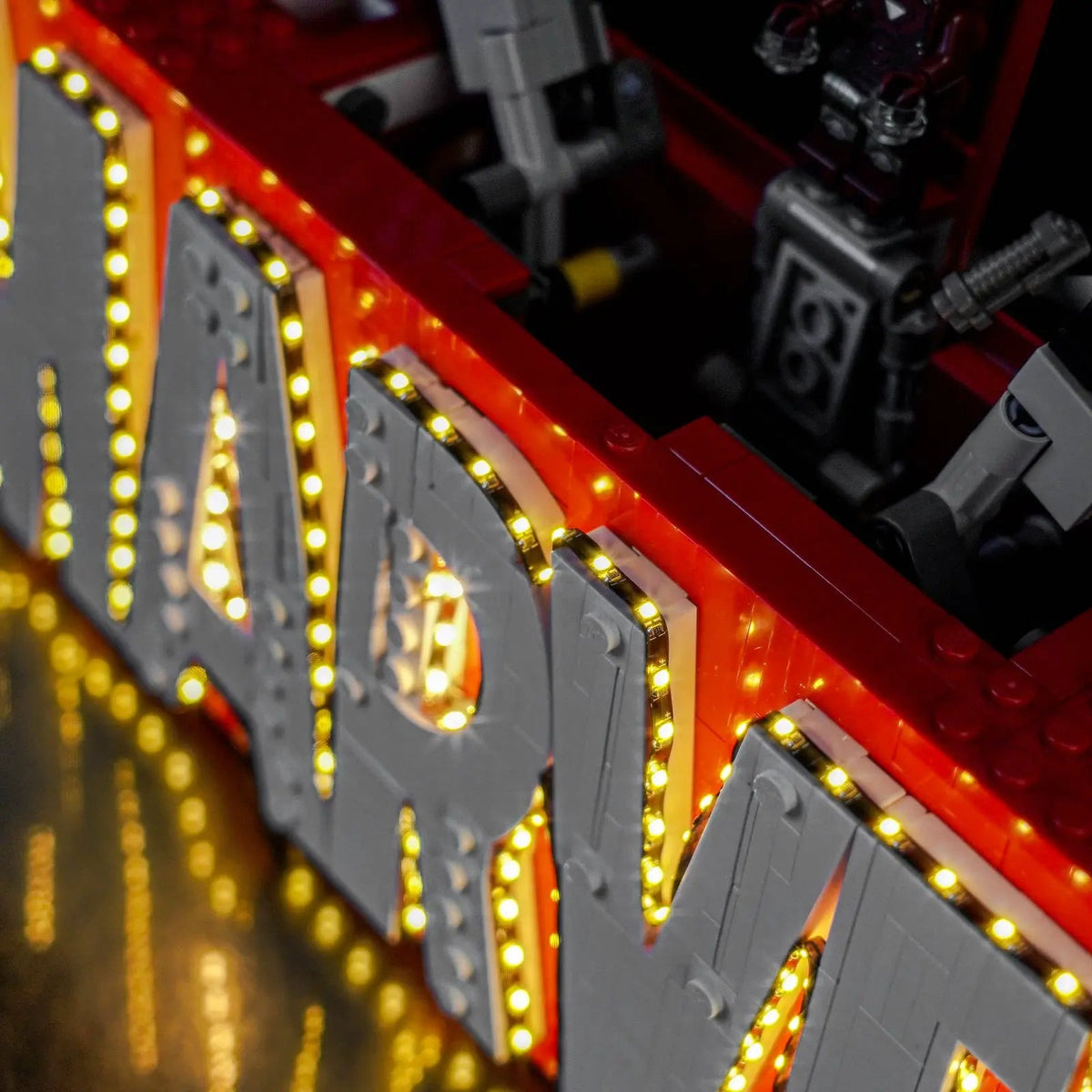 LEGO® Marvel MARVEL Logo & Minifigures #76313 close-up of the LED lighting detail, with the premium LED light kit