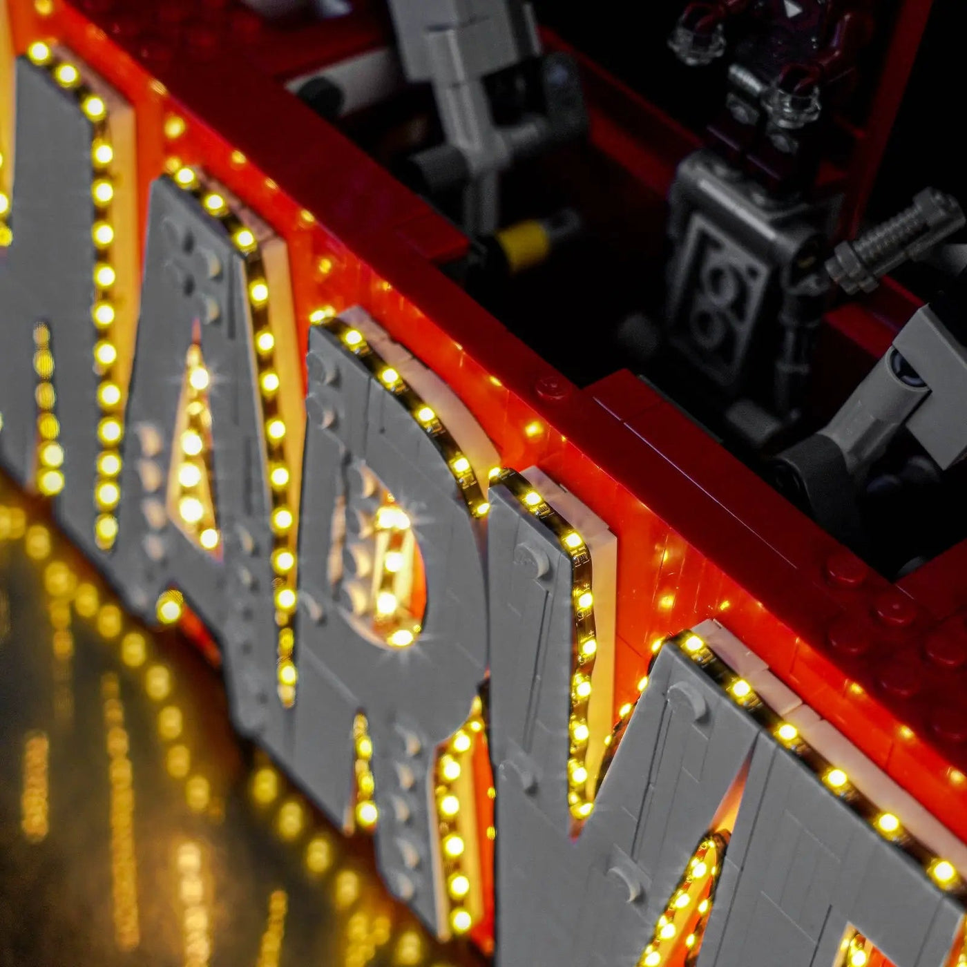 LEGO® Marvel MARVEL Logo & Minifigures #76313 close-up of the LED lighting detail, with the premium LED light kit