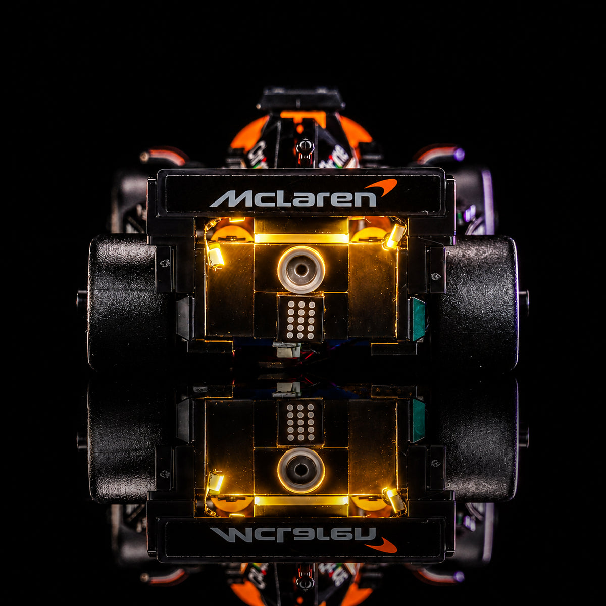 side angle with lights on: Bright My Bricks LED light kit for LEGO® McLaren F1 Team MCL38 Race Car #77251