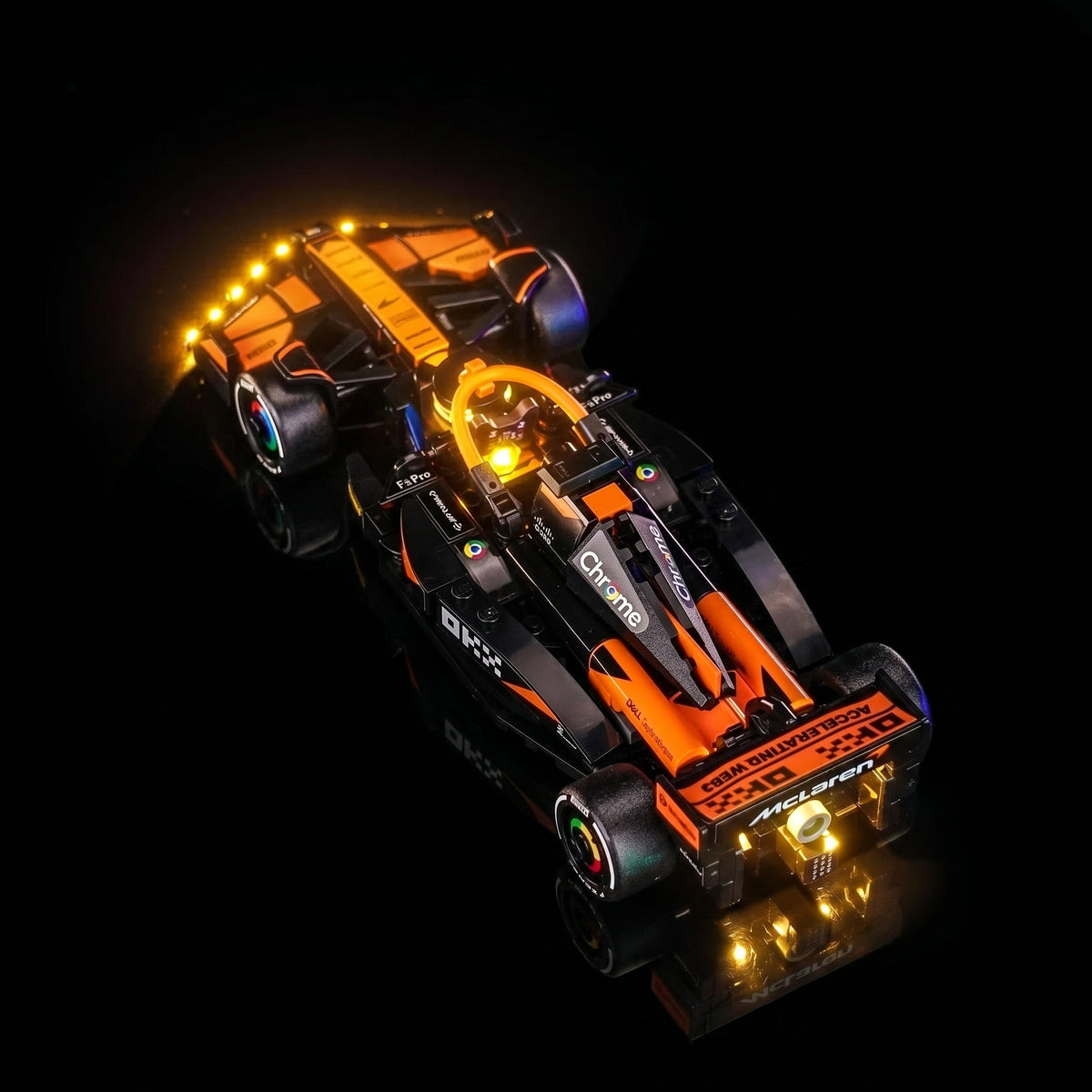Bright My Bricks DIY LED light kit for LEGO® McLaren F1 Team MCL38 Race Car #77251 — fully illuminated on display