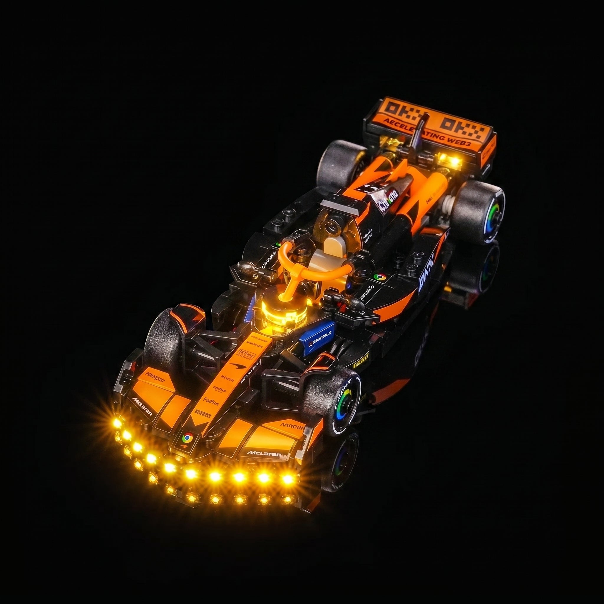 Bright My Bricks USB-powered LED light kit for LEGO® McLaren F1 Team MCL38 Race Car #77251 — fully illuminated on display