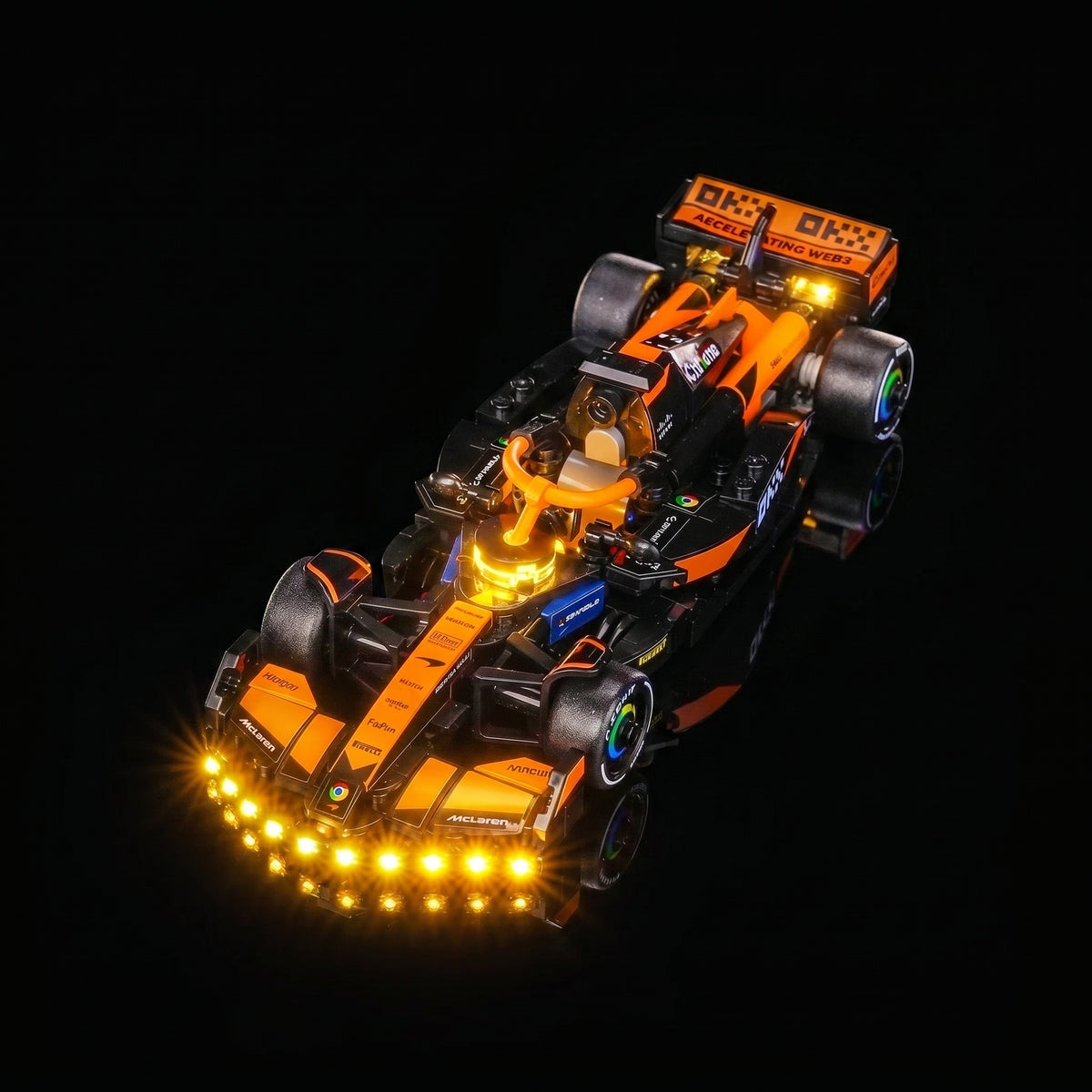Bright My Bricks USB-powered LED light kit for LEGO® McLaren F1 Team MCL38 Race Car #77251 — fully illuminated on display