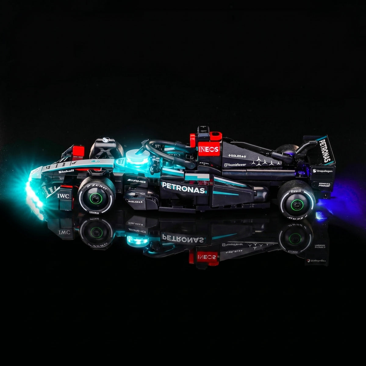 LEGO® Mercedes-AMG F1 W15 Race Car #77244 fully illuminated on display, with the LED lighting kit