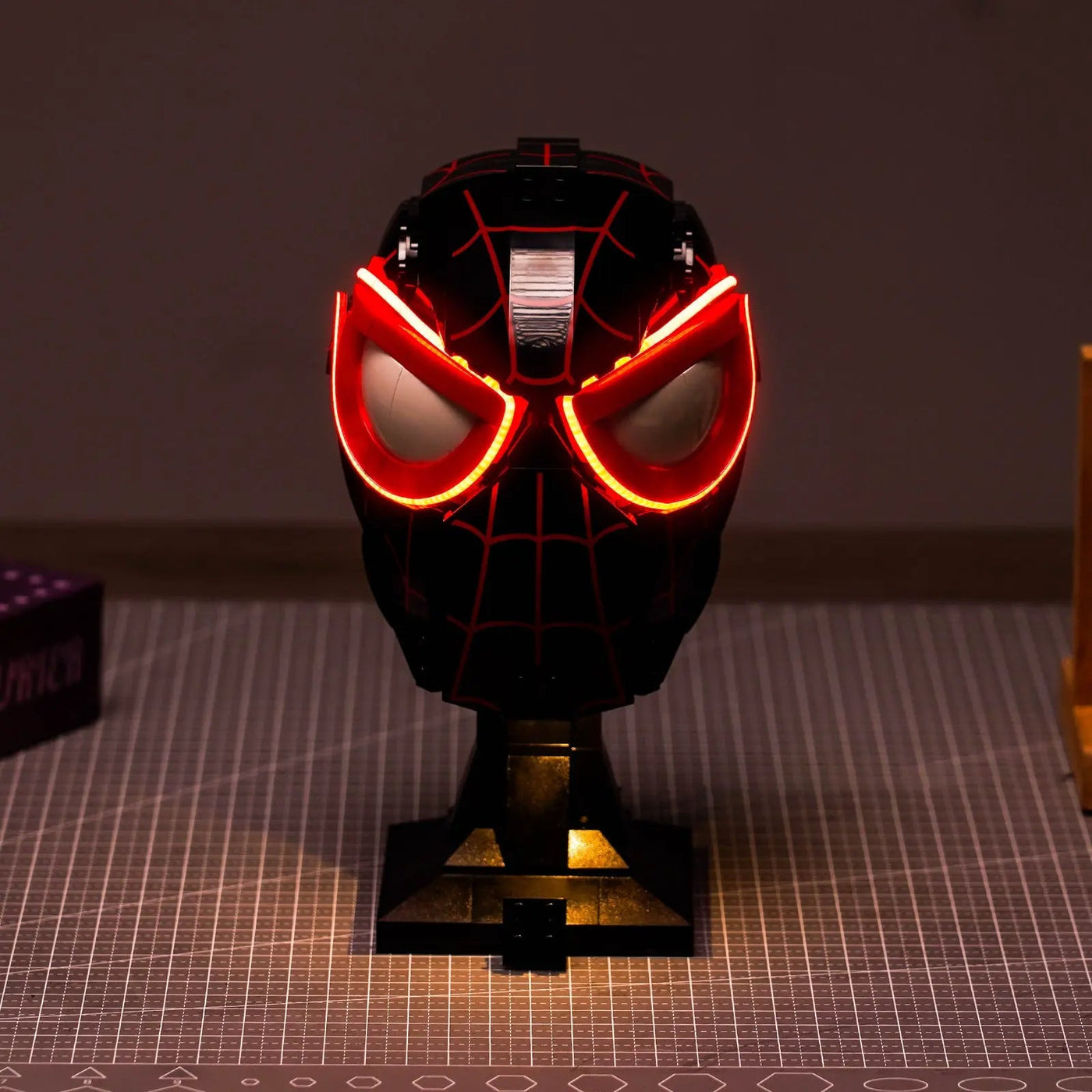 LEGO® Miles Morales' Mask #76329 before-and-after lighting, with the LED lighting kit