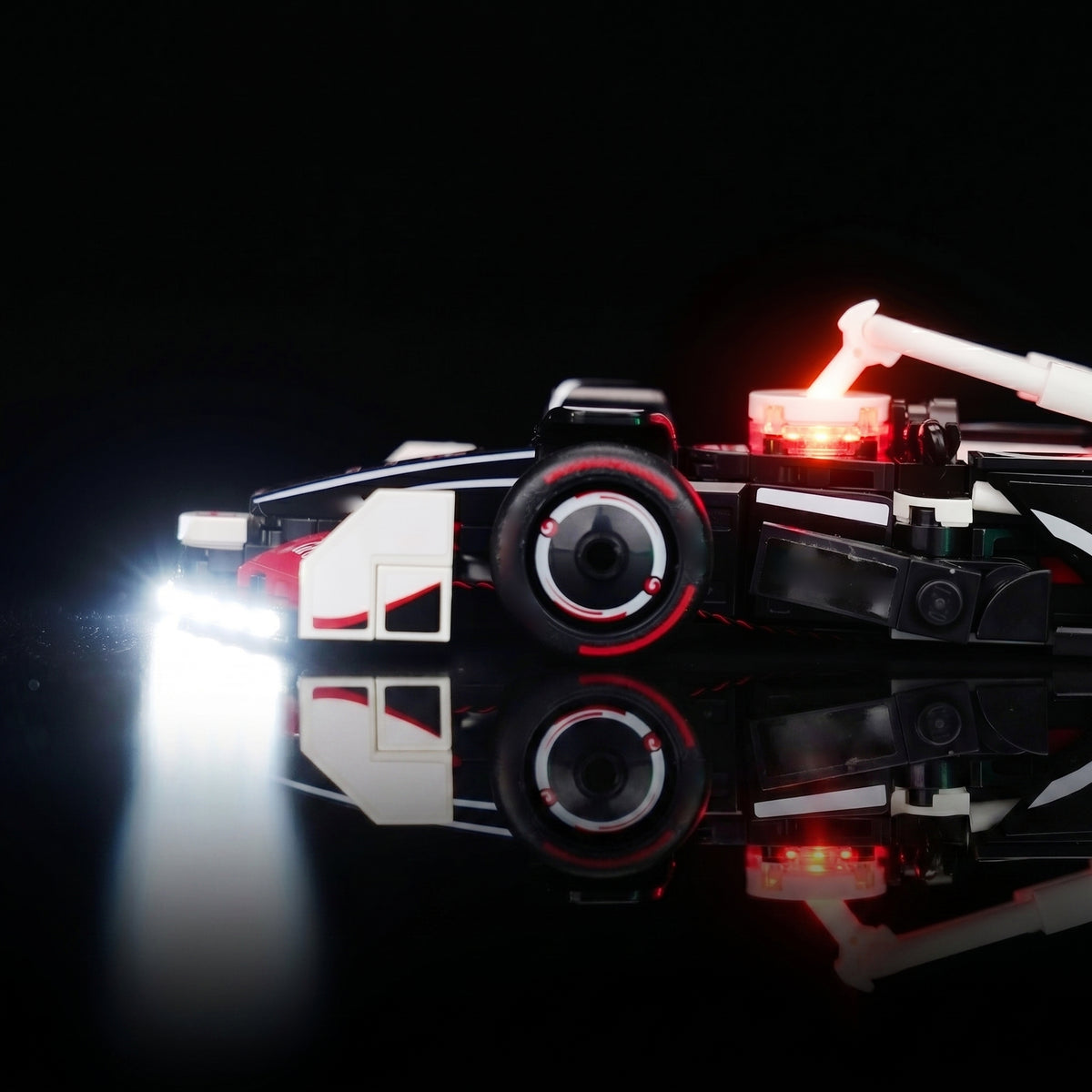 LED lighting kit for LEGO® MoneyGram Haas F1 Team VF-24 Race Car #77250, before-and-after lighting