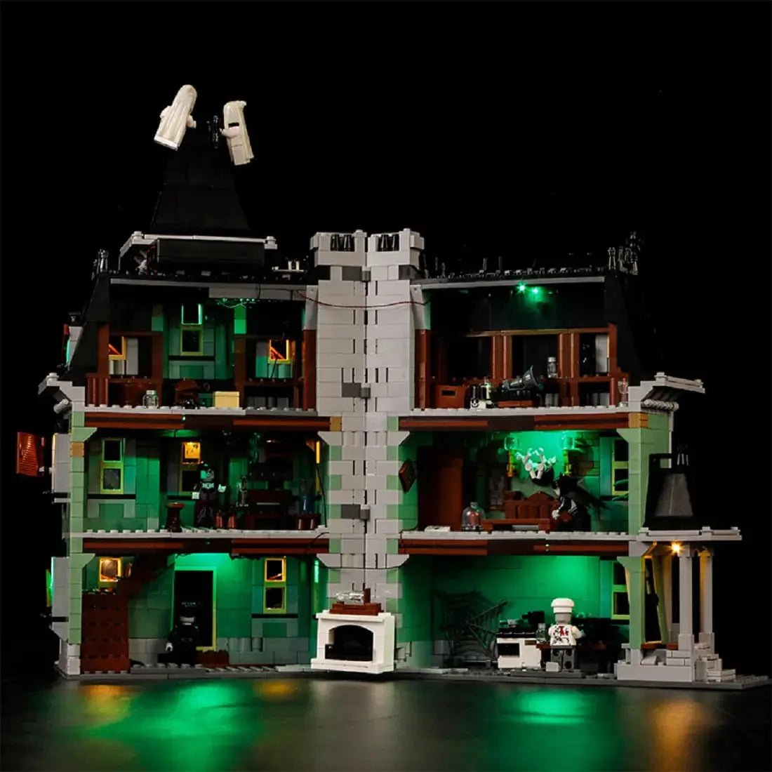 LEGO Monster Fighters Haunted House #10228 illuminated at night