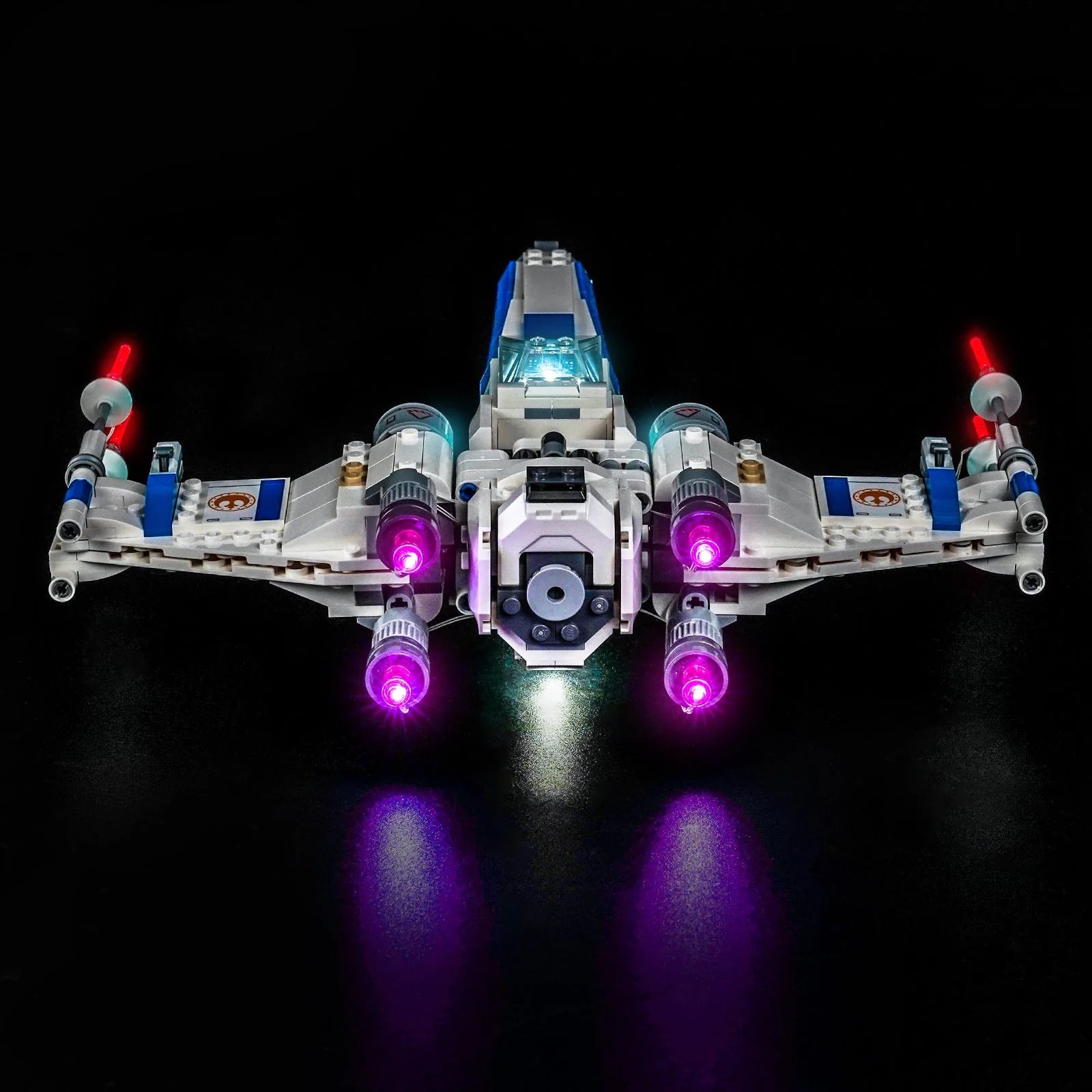 LEGO New Republic X-Wing Starfighter #75460 illuminated at night