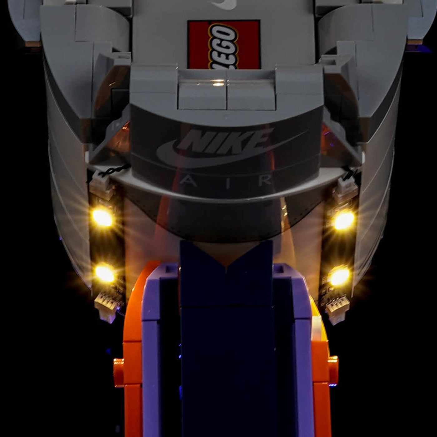 LEGO® Nike Air Force 1 #43026 warm light along the striped sole, with the USB-powered LED light kit