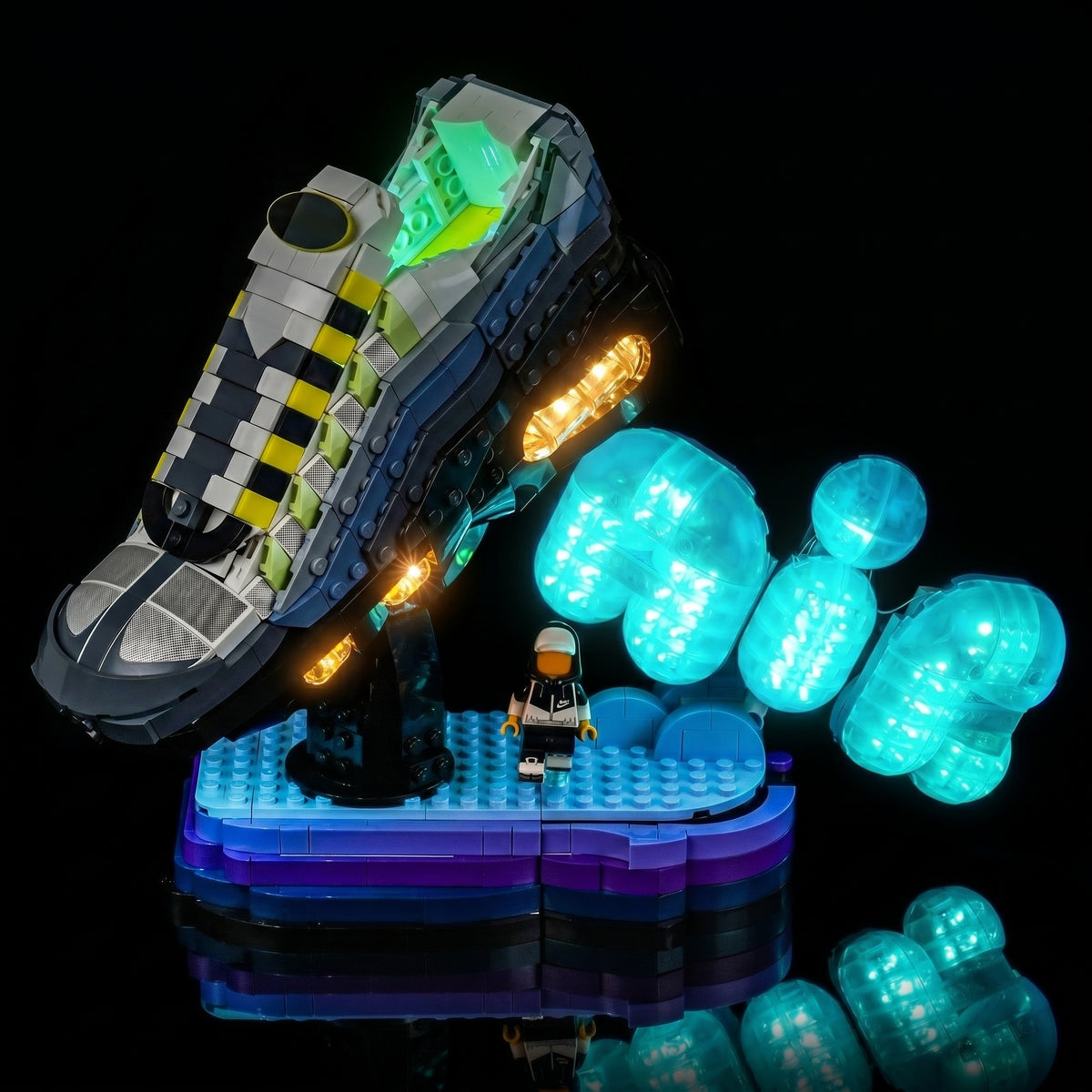 LEGO® Nike Air Max 95 #43025 fully illuminated on display, with the display light kit