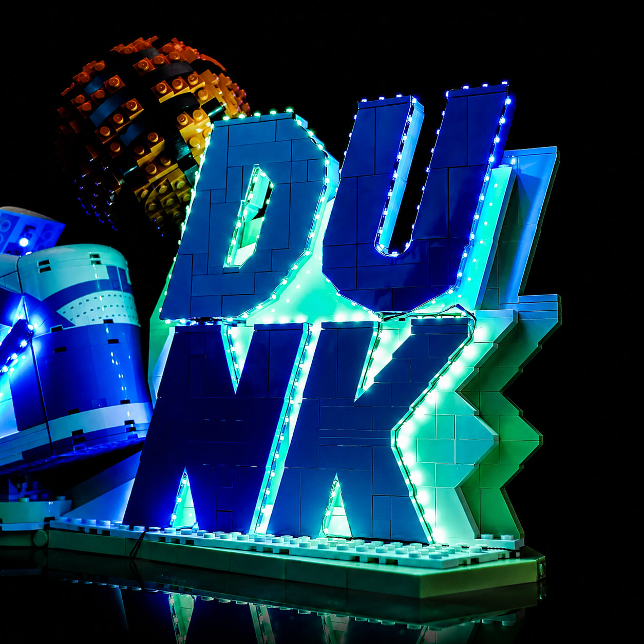 LEGO® Nike Dunk #43008 fully illuminated on display, with the premium LED light kit