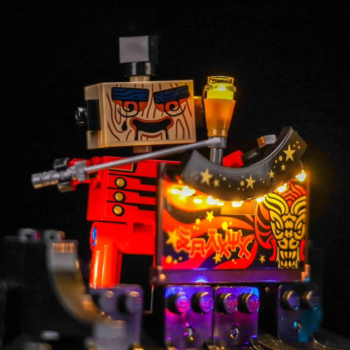 LEGO® NINJAGO City Workshops #71837 side angle with lights on, with the display light kit