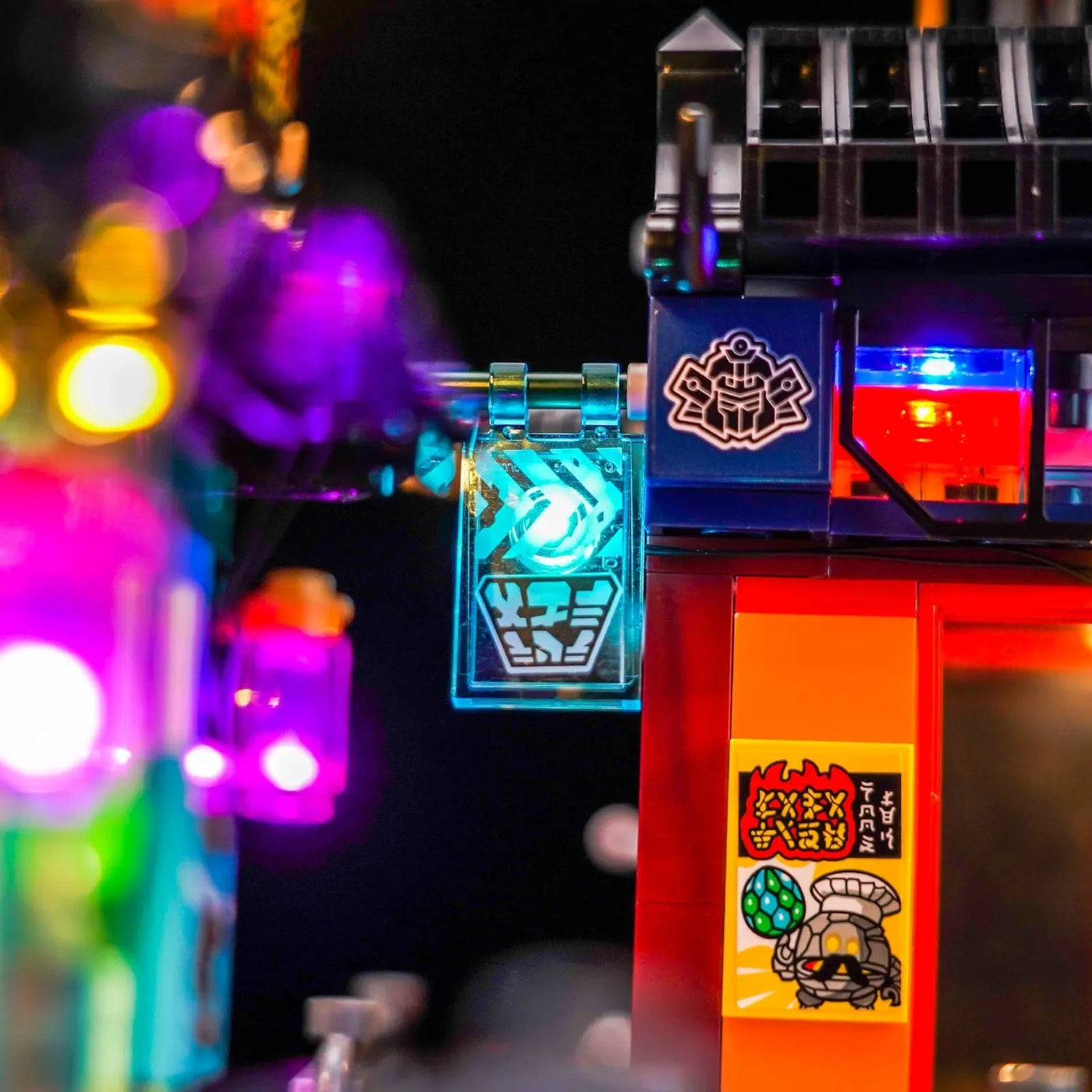 LEGO® NINJAGO City Workshops #71837 — front view fully lit (DIY LED light kit)
