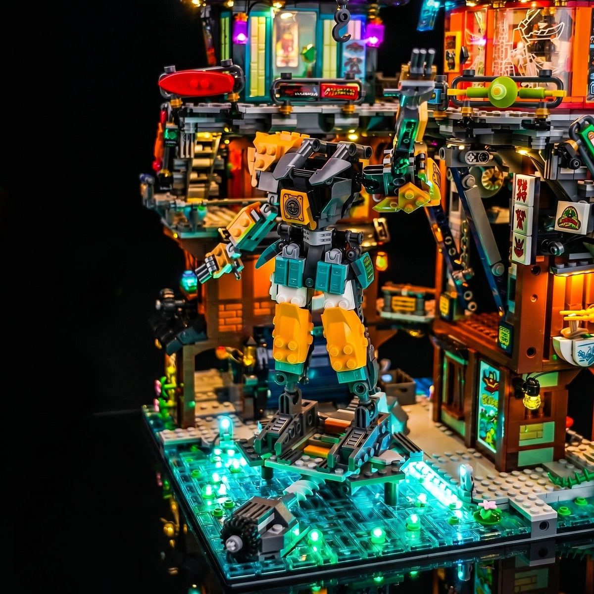 LEGO® NINJAGO City Workshops #71837 front view fully lit, with the DIY LED light kit