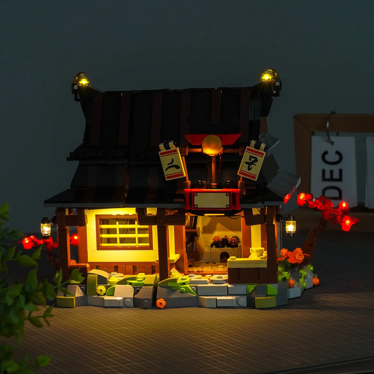 LEGO® Ninjago Four Weapons Blacksmith 15th Anniversary #71858 — illuminated at night (custom LED lighting)