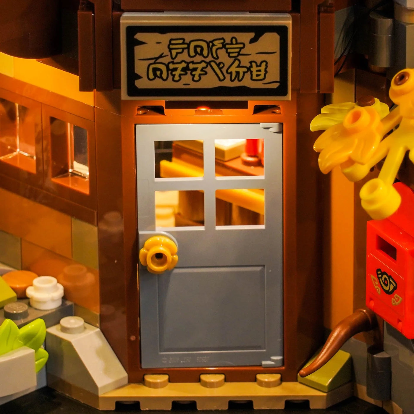 LEGO® NINJAGO The Old Town 15th Anniversary #71861 lighting effect on the build, with the LED lighting kit