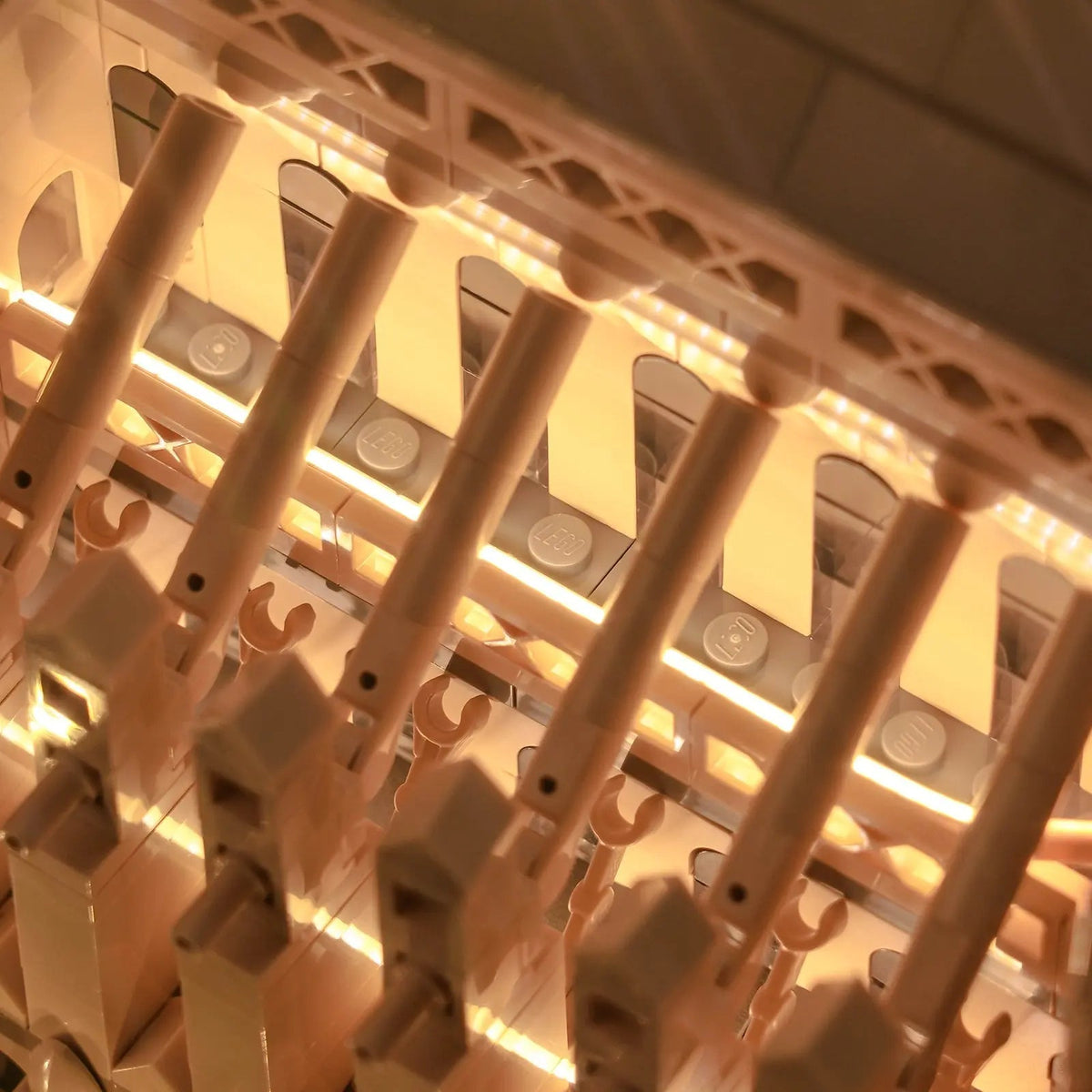 LEGO® Notre-Dame de Paris #21061 fully illuminated on display, with the LED light kit