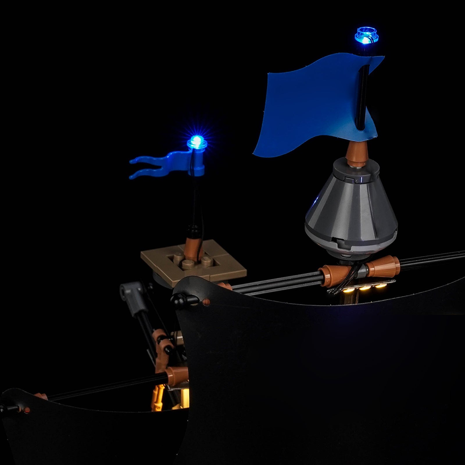 LEGO® One Piece Garp's Marine Battleship #75646 display lighting in a dark room, with the premium LED light kit