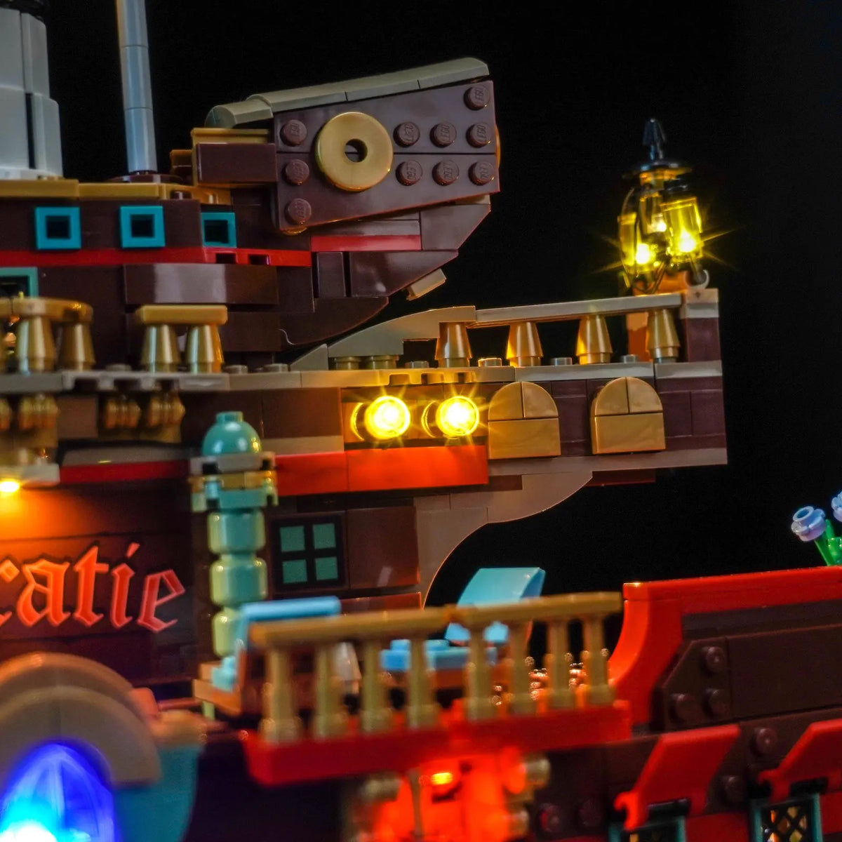 LEGO® One Piece The Baratie Floating Restaurant #75640 installed and glowing, with the display light kit
