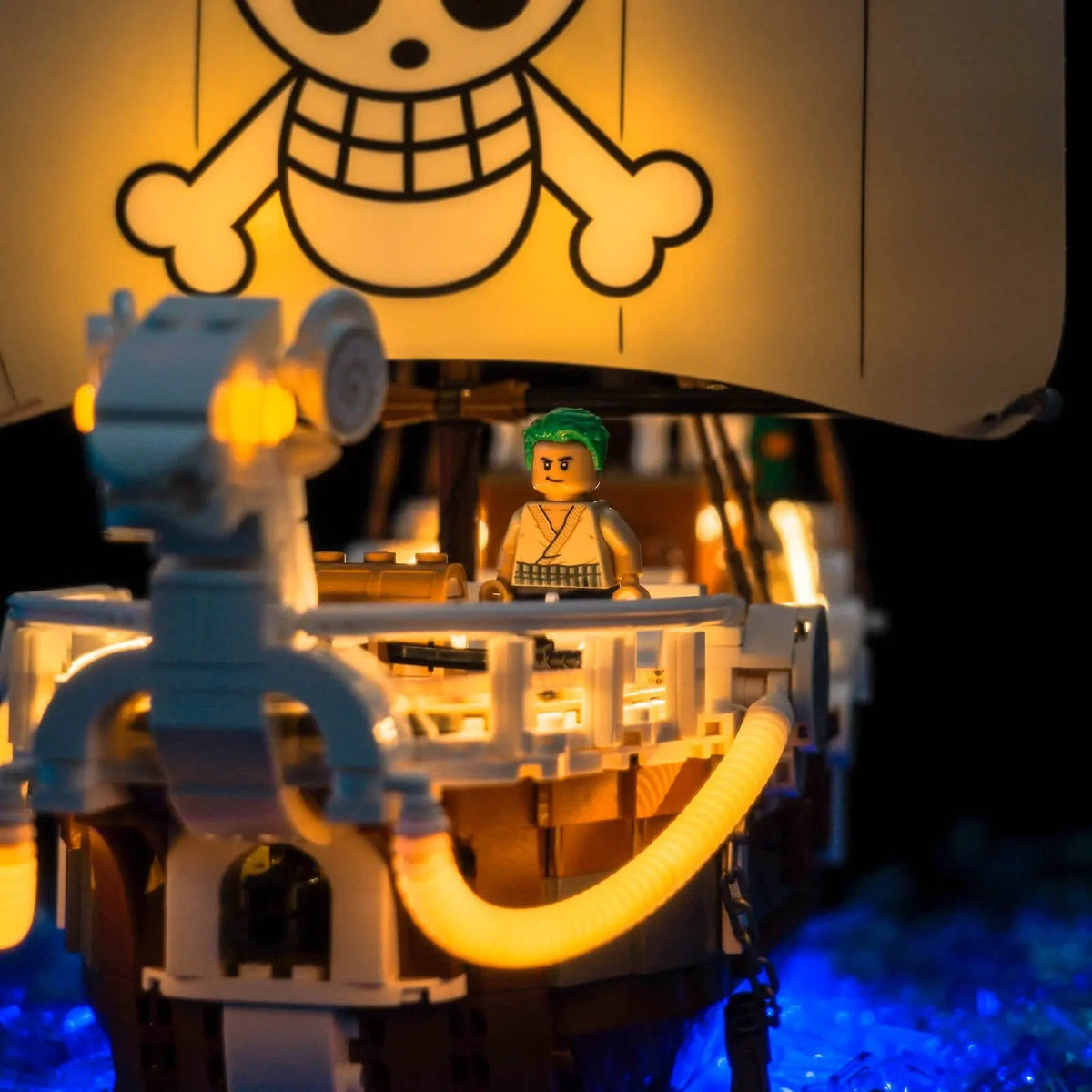 LEGO® One Piece The Going Merry Pirate Ship #75639 LED kit powered on, with the DIY LED light kit