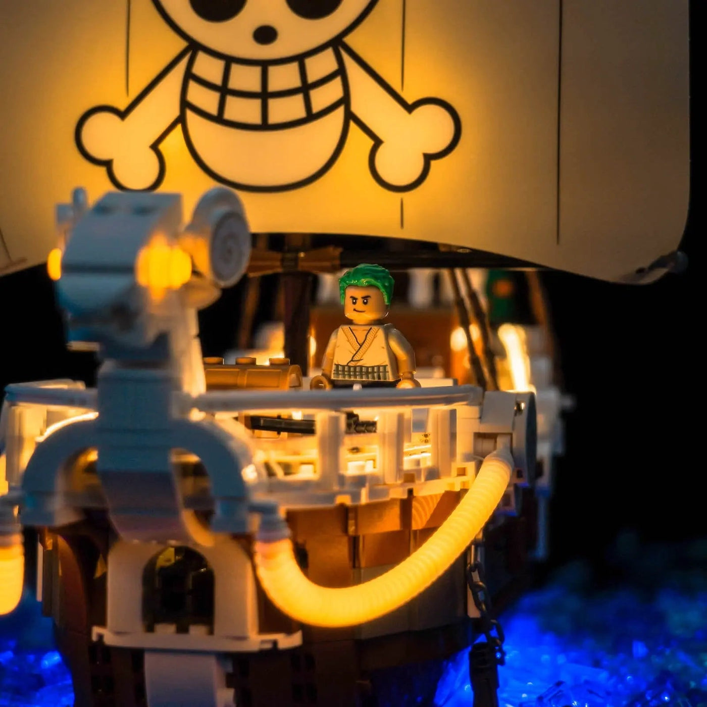 LEGO® One Piece The Going Merry Pirate Ship #75639 LED kit powered on, with the DIY LED light kit