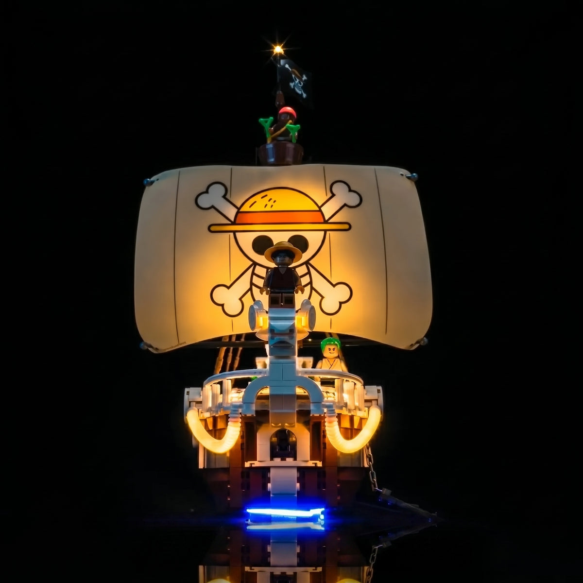 LEGO® One Piece The Going Merry Pirate Ship #75639 LED kit powered on, with the LED lights