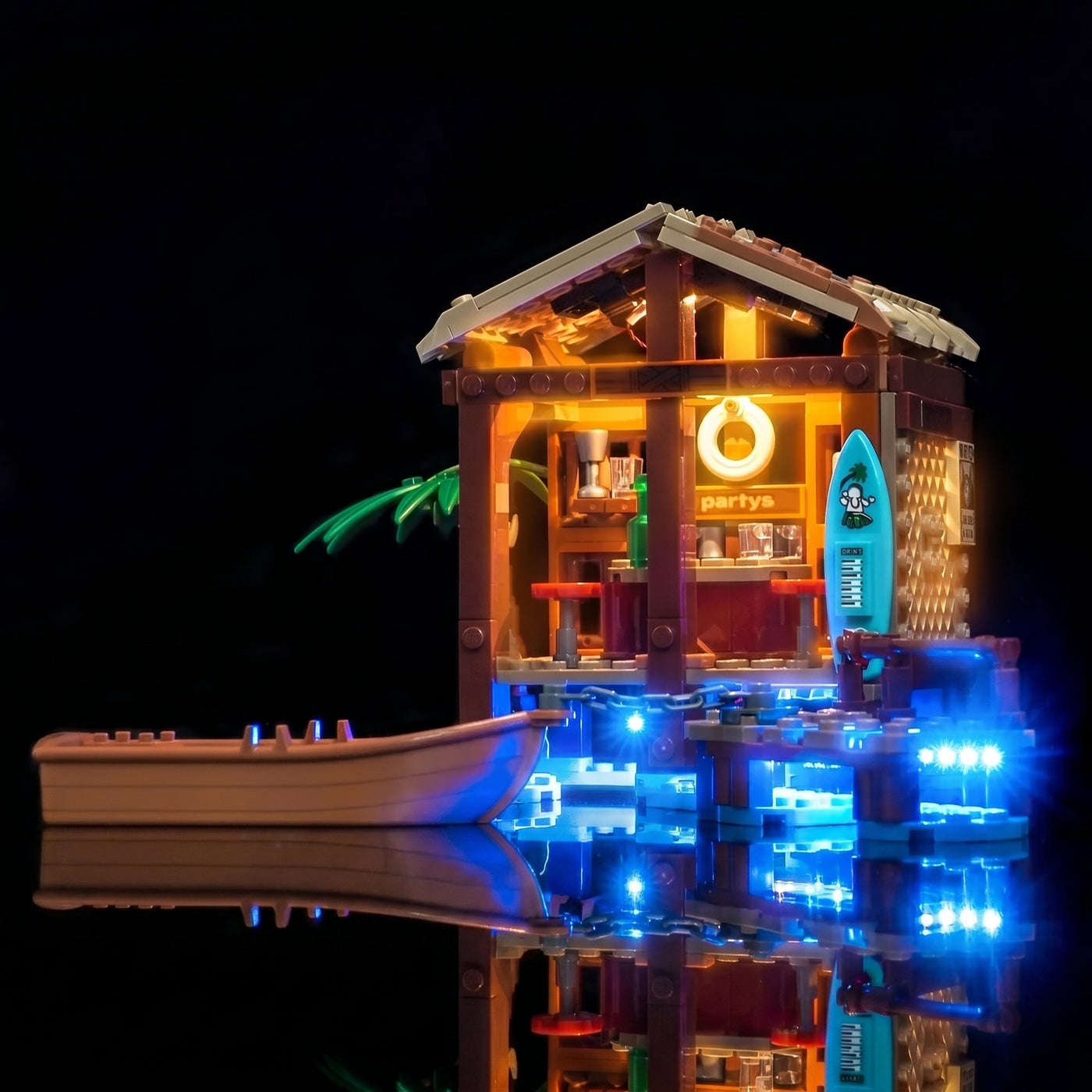 LEGO® One Piece Windmill Village Hut #75636 LED kit powered on, with the RGB LED light kit