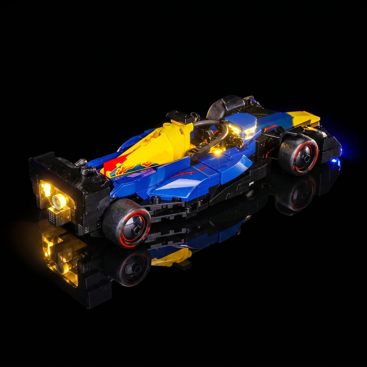 LEGO® Oracle Red Bull Racing RB20 F1 Race Car #77243 installed and glowing, with the light kit