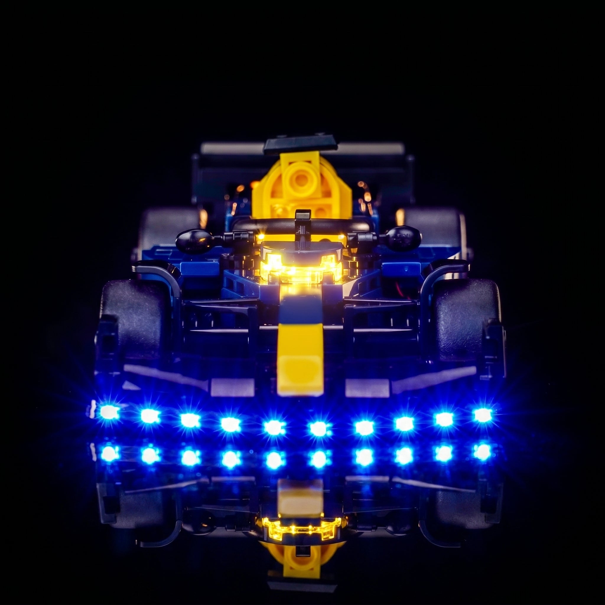 Bright My Bricks custom LED lighting for LEGO® Oracle Red Bull Racing RB20 F1 Race Car #77243 — illuminated at night