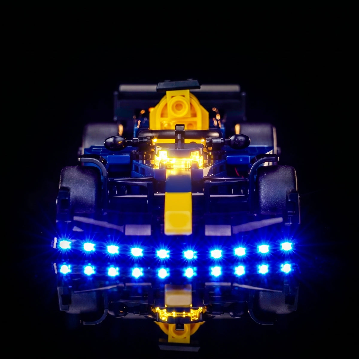 Bright My Bricks custom LED lighting for LEGO® Oracle Red Bull Racing RB20 F1 Race Car #77243 — illuminated at night