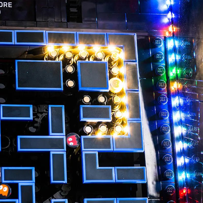 LEGO® PAC-Man Arcade #10323 fully illuminated on display, with the premium LED light kit