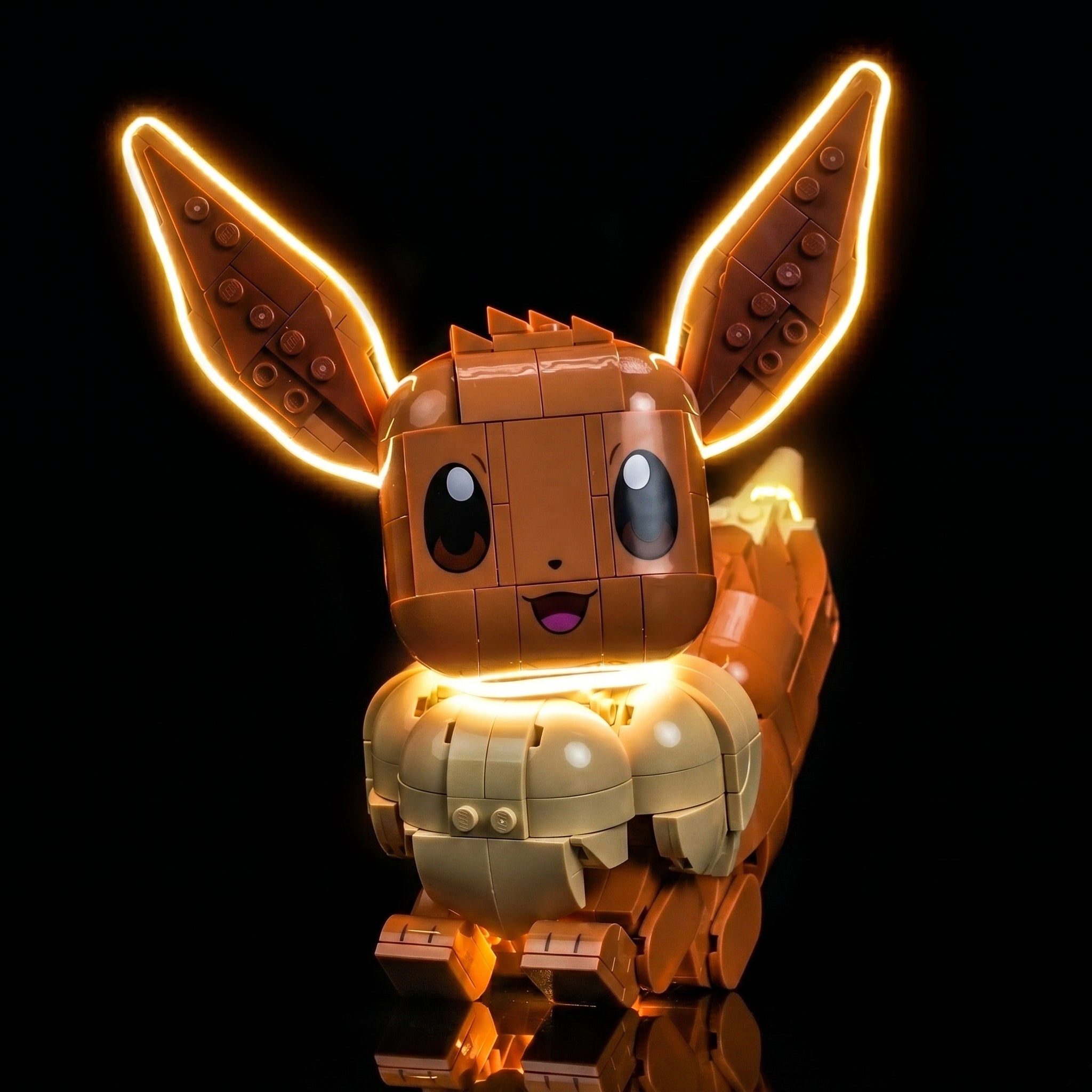 LEGO® Pokémon Eevee #72151 display lighting in a dark room, with the USB-powered LED light kit